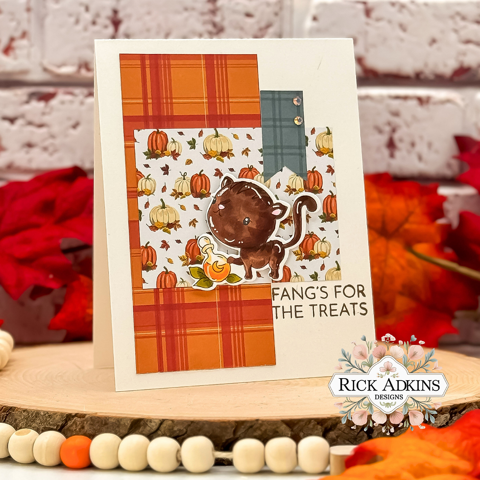 Cute card featuring a brown cartoon cat with a pumpkin on a fall-themed background with pumpkins and plaid patterns. Text: "Fang's for the treats."