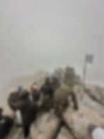 Tour group gathering at the top of Mytikas Peak