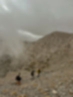 Hikers descending down Mount Olympus