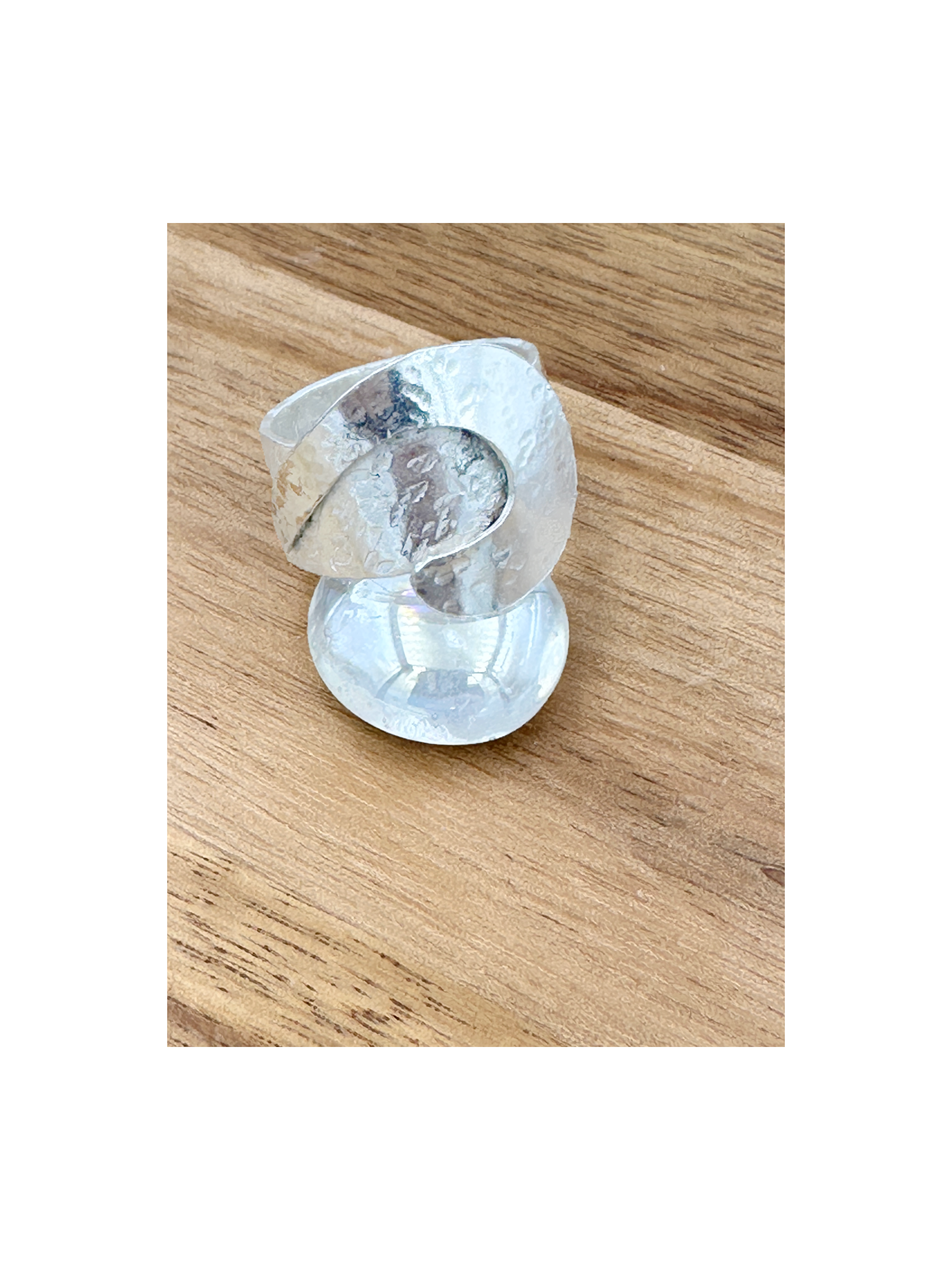 Wide hammered S shape ring