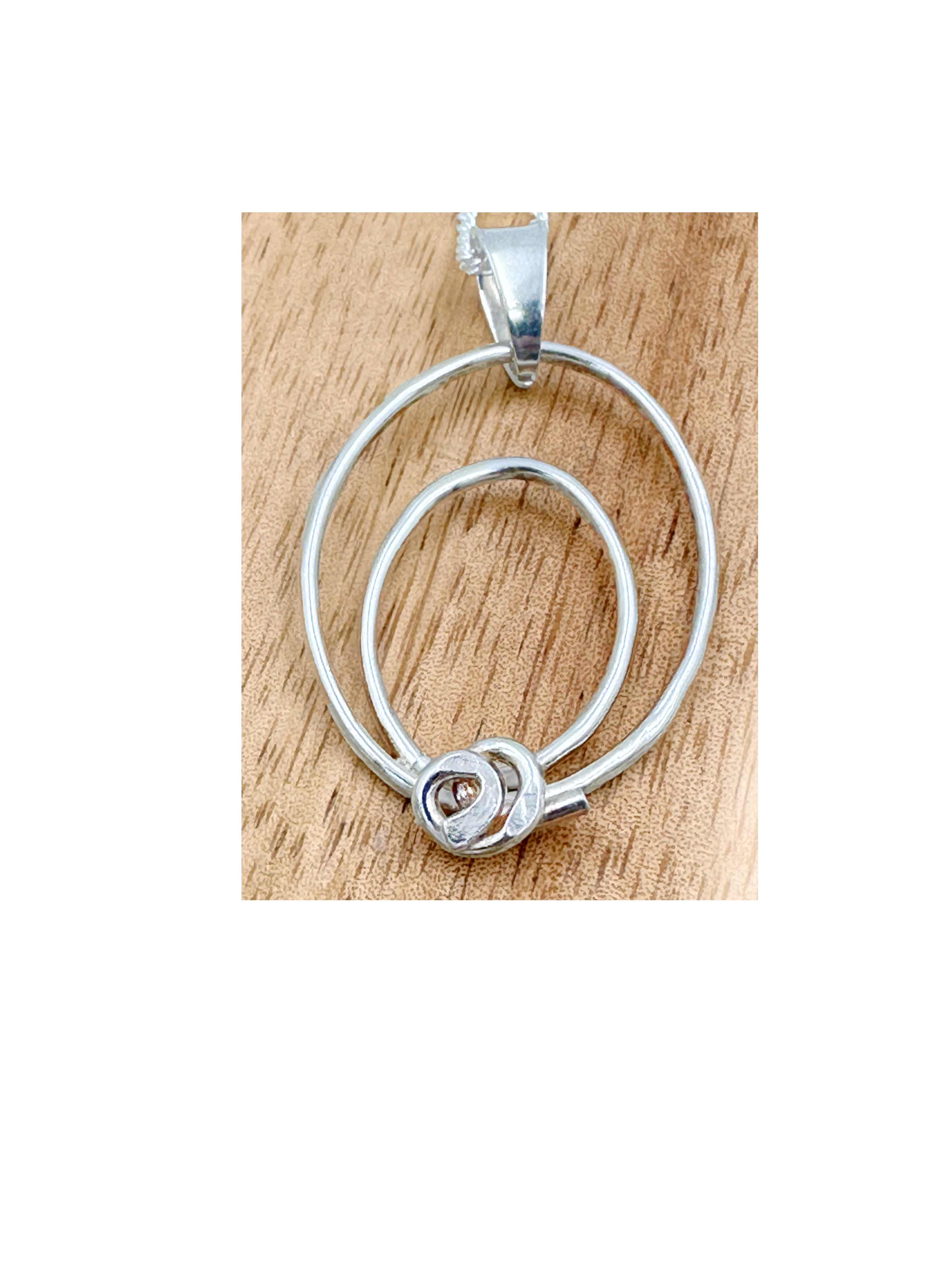 Sterling Silver Double Oval Pendant with signature swirl