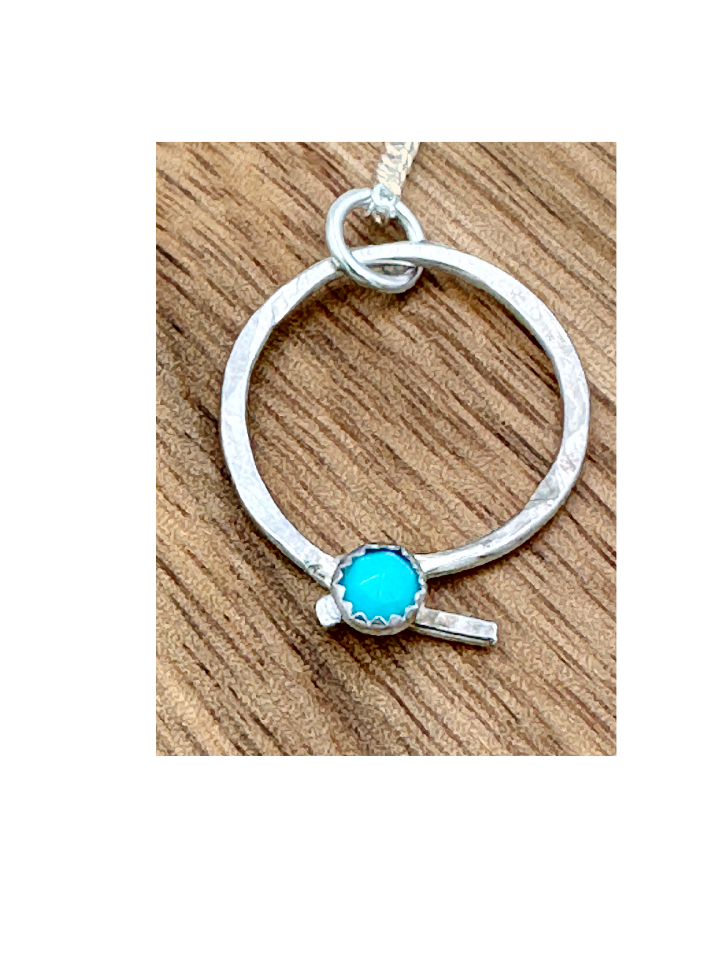 Sterling Silver Knot Pendant set with a Turquoise gemstone