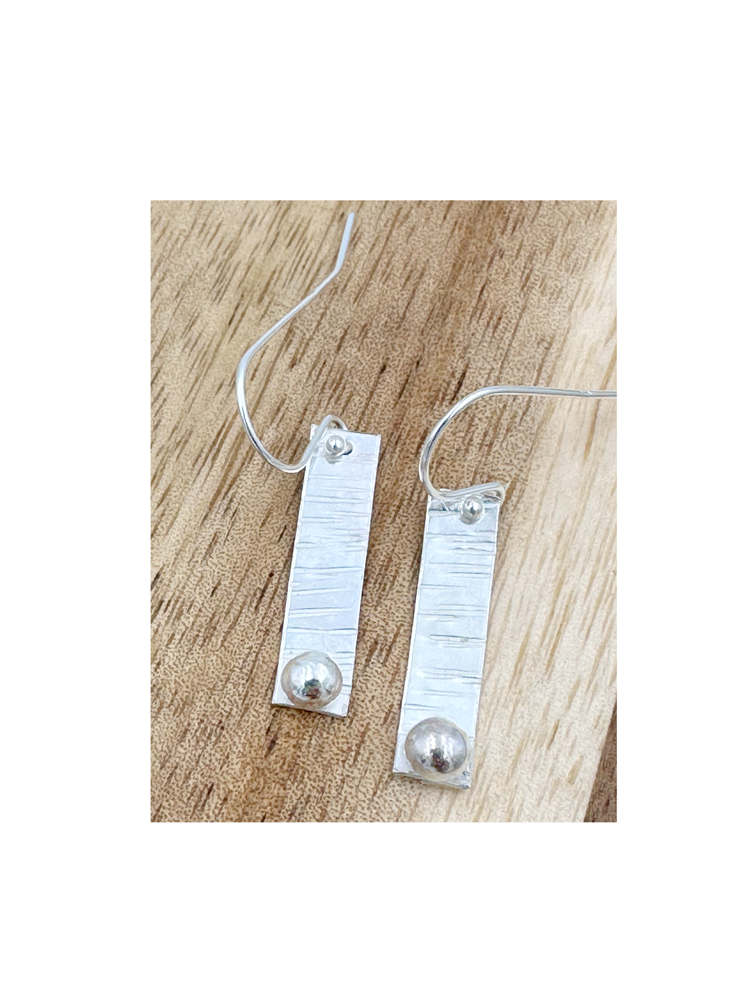 Sterling silver oval bark effect oblong earrings with ball detail