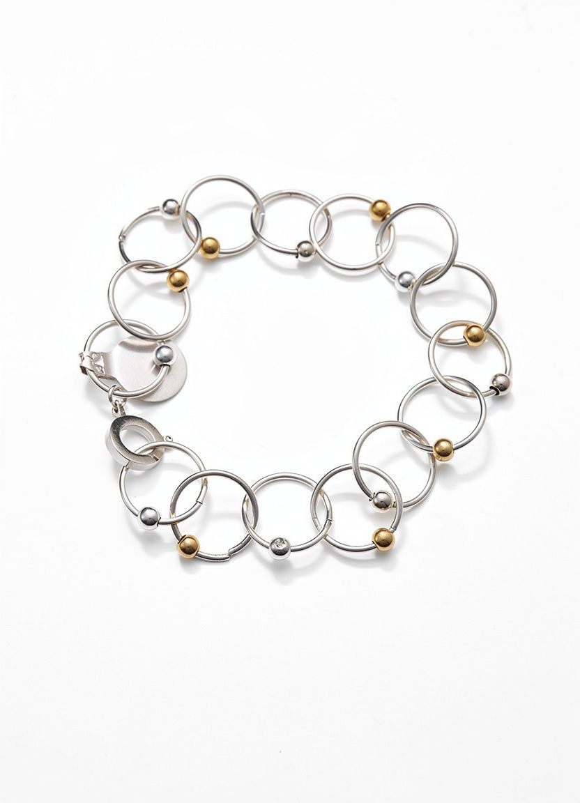 Circles linked bracelet with silver and gold beads