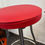 Miniaturbild: Vintage Hocker mit Gestell aus Stahlrohr & rotem Kunstledersitz