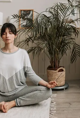 woman doing yoga relieving from panic disorder.
