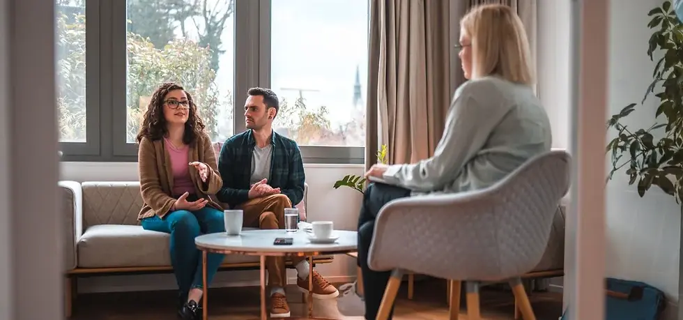 Therapist giving marriage counseling tips to a couple