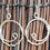 Thumbnail: Handmade silver tone hoops with wire wrap 