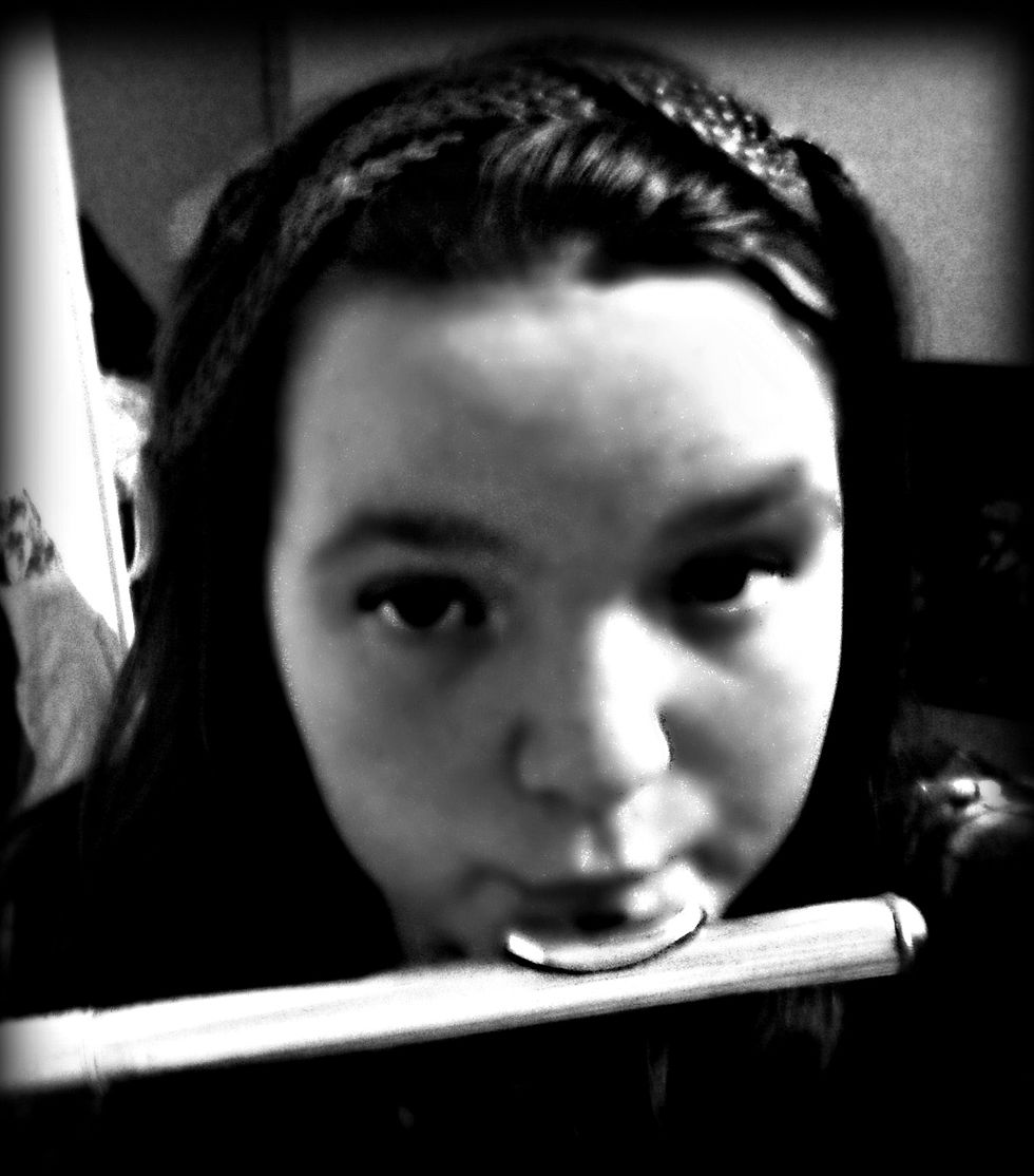 Naomi playing the flute.jpg