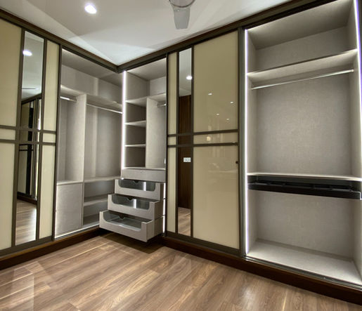 L-shaped Walk-in Dressing Wardrobe with Internal LED Lighting in Kharadi Pune | Verb Interior