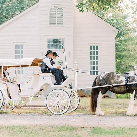 Bride-Groom on the carriage church - KevynDixonPhotography_KaitlynBrockWedding-62.webp