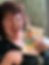 Laughing woman holds a birthday card with colorful balloons; text reads Birthday girl—who deserves every dream in your heart to come true. true happiness is expressed in this picture.