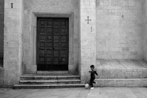 robert-bonk_boy-kicking-soccerball-bari-italy-2018.jpeg