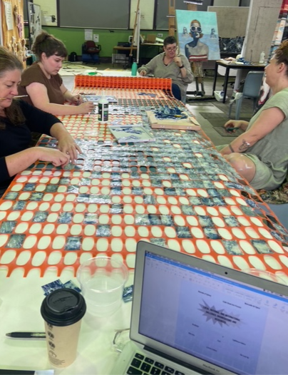 Figure 5. The gluing of the cyanotypes with Lesley, 2026, photograph by Indy Marsden