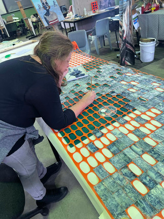 Figure 2. The gluing of the cyanotypes, 2026, photograph by Den Milenkovic