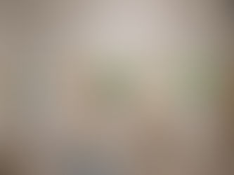 Three aquariums on pedestals in a tiled room. Each tank has plants; one has goldfish. Electric cords are visible below.