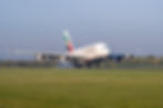 Emirates Airbus A380-861 registered A6-EOY touches down at Manchester from Dubai
