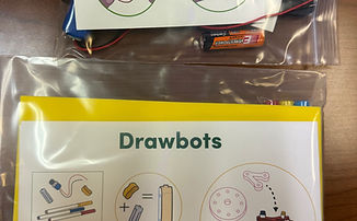 student inventing machine to make art.jpg