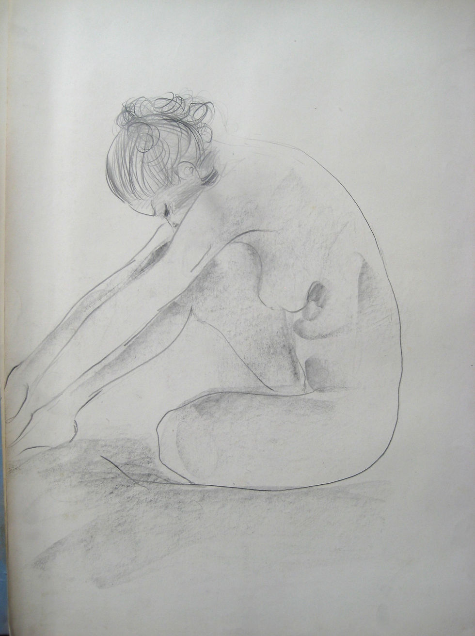 "Nude resting head on knee"