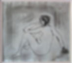 Seated figure with hand on chin