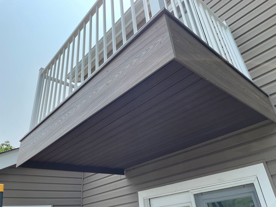 Deckorators composite decking balcony in Republic, Missouri, showcasing durable low-maintenance boards and railing