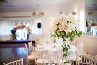 Vibrant decorations and smiling guests at a lively event, taken during a party photography London session