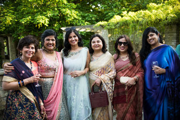 Vibrant decorations and smiling guests at a lively event, taken during a party photography London session