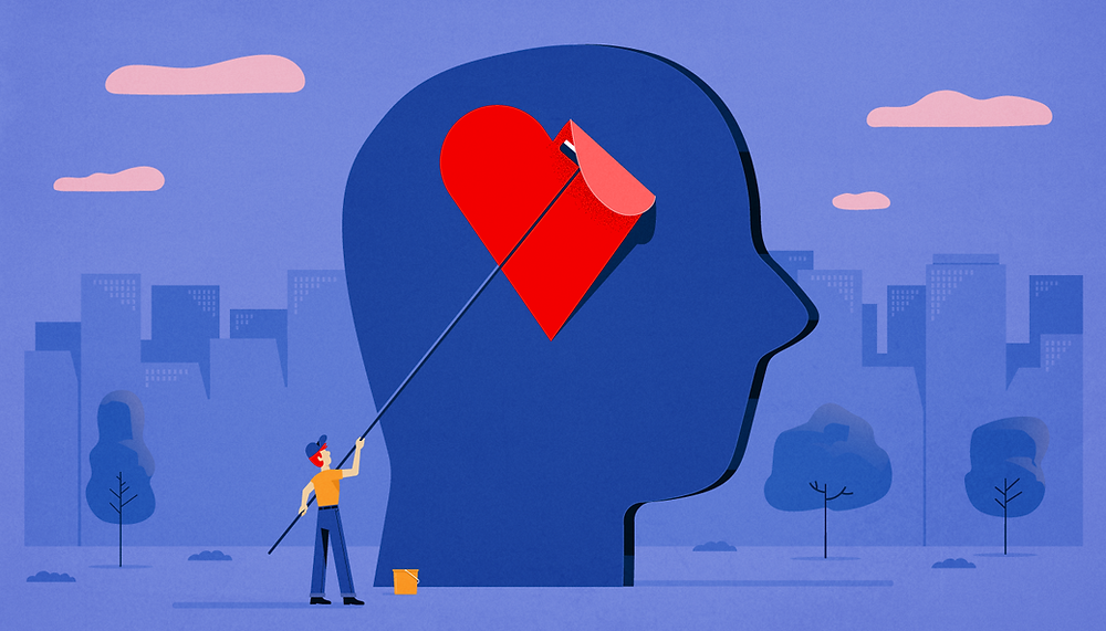 A guy placing a paper heart on a gigantic head to illustrate how the tone of a brand impacts on the audience.