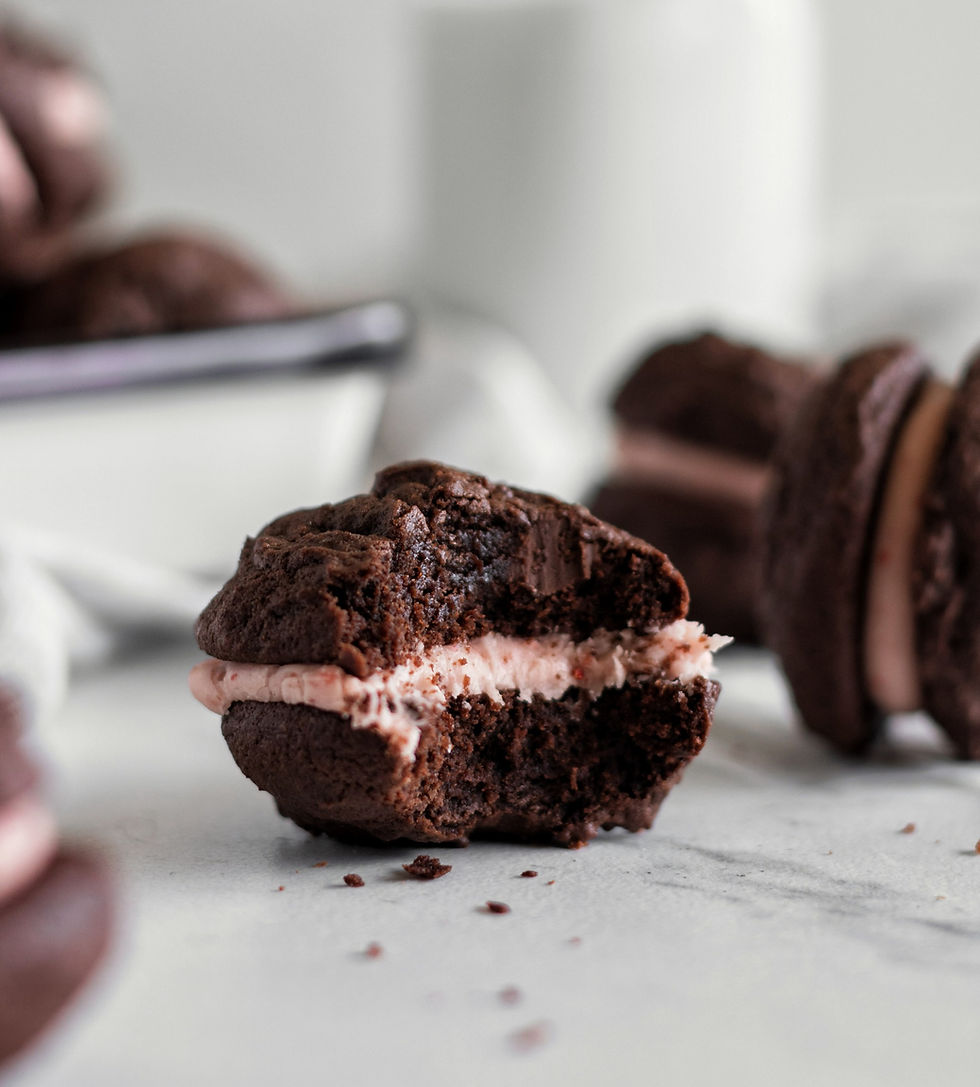 Chocolate Sandwich Cookies with Strawberry Cream Cheese Frosting