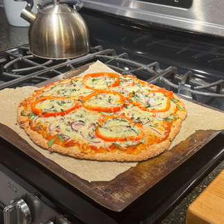 baked pizza on baking sheet 