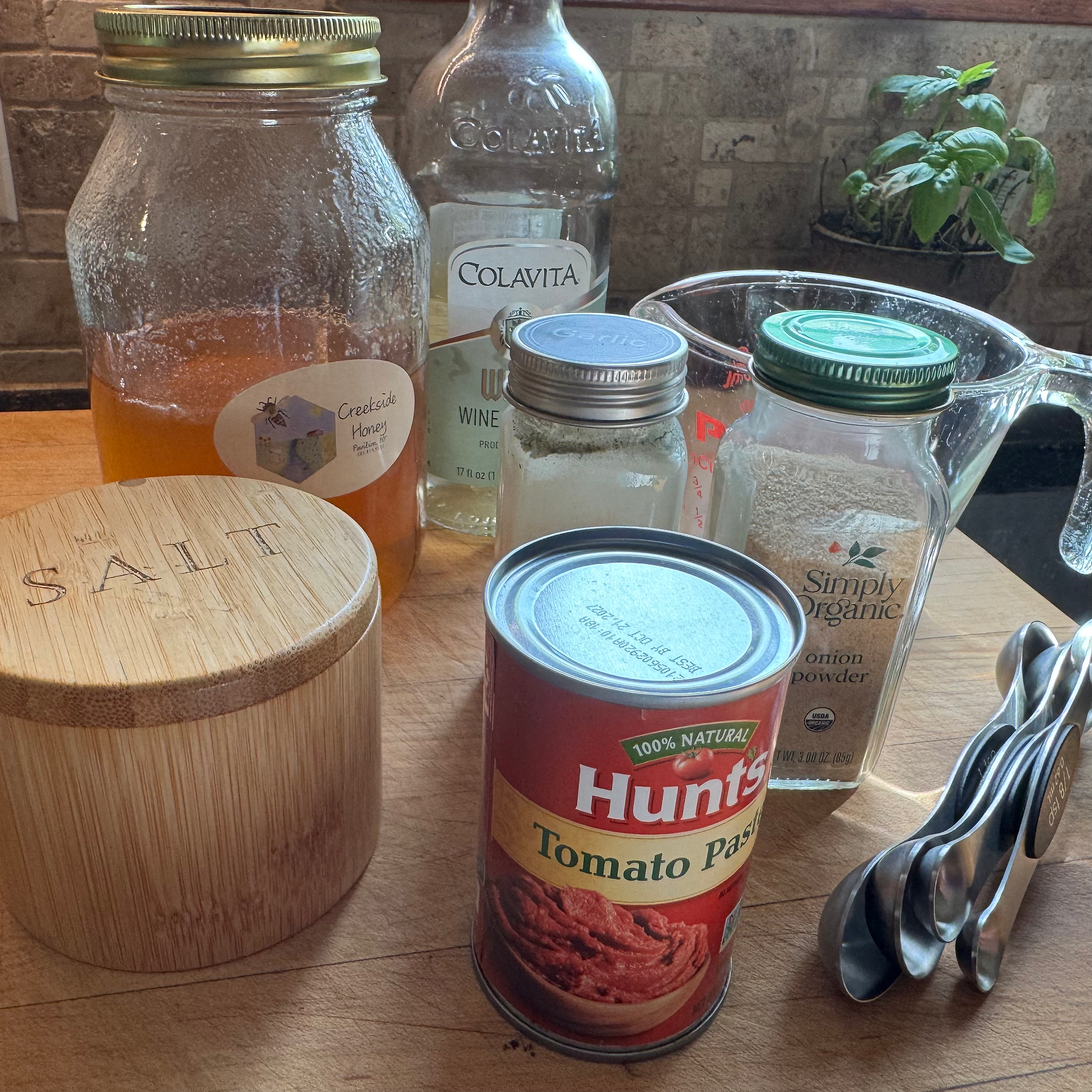 Ketchup ingredients on a wooden cutting board