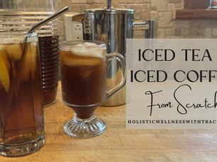 A glass of iced tea and a glass of iced coffee on a wooden cutting board with text reading Iced Tea & Iced Coffee From Scratch holisticwellnesswithtracym.com