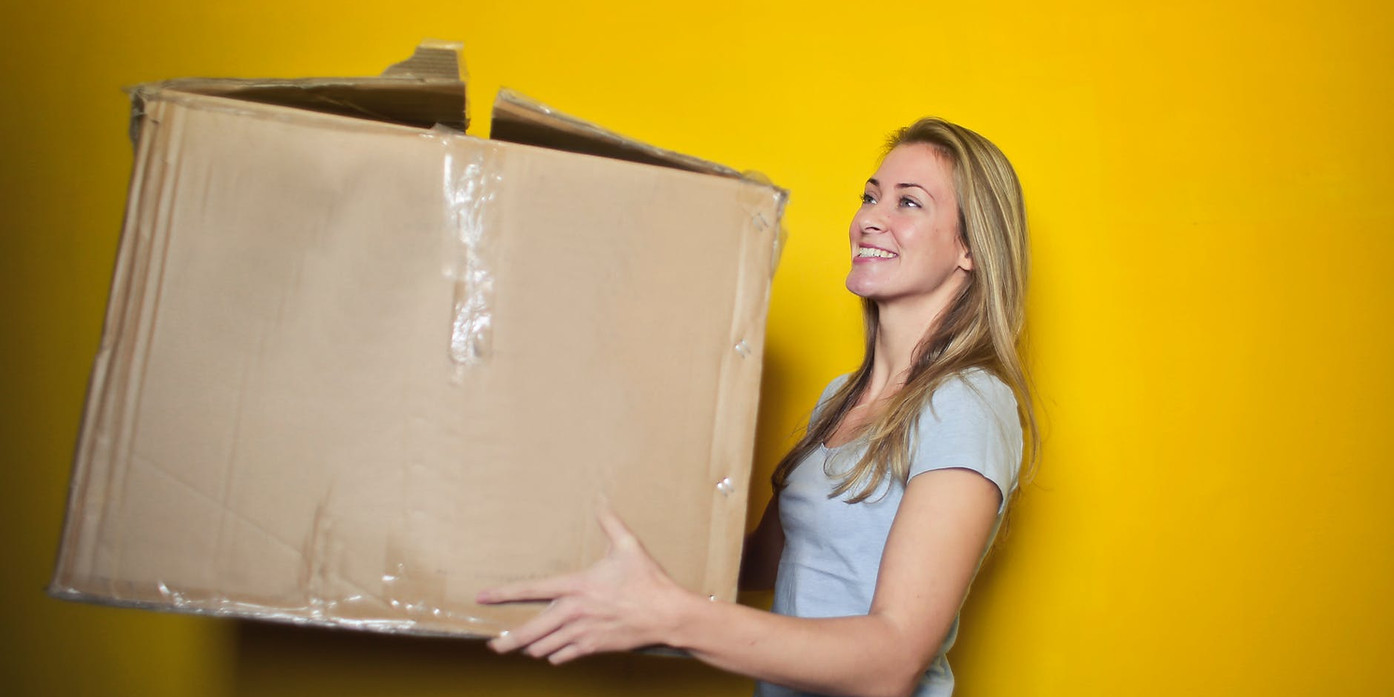 Woman carrying a box