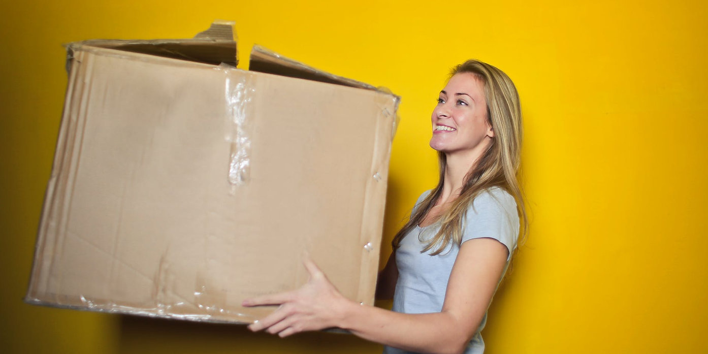 Woman carrying a box
