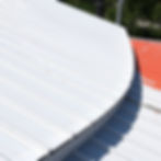 white acrylic roof coating on metal roof.jpg