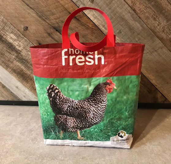Repurposed chicken feed sack made into shopping bag. Blue Earth Bags