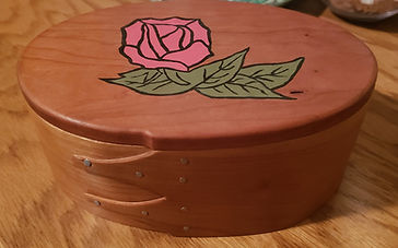 oval wooden box with flower etched into top, grandpa made, I painted the flower pink