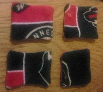 Red and Green Minnesota Wild Coasters from the corners of the tie blanket