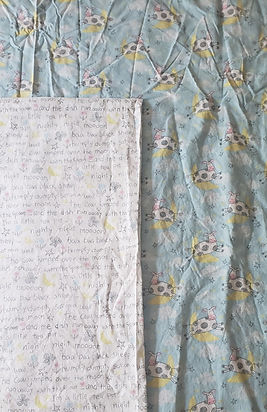 Cow Nursery Fabric and the Cow Jumped Over the Moon Nursery Rhyme Fabric, used to make a baby blanket