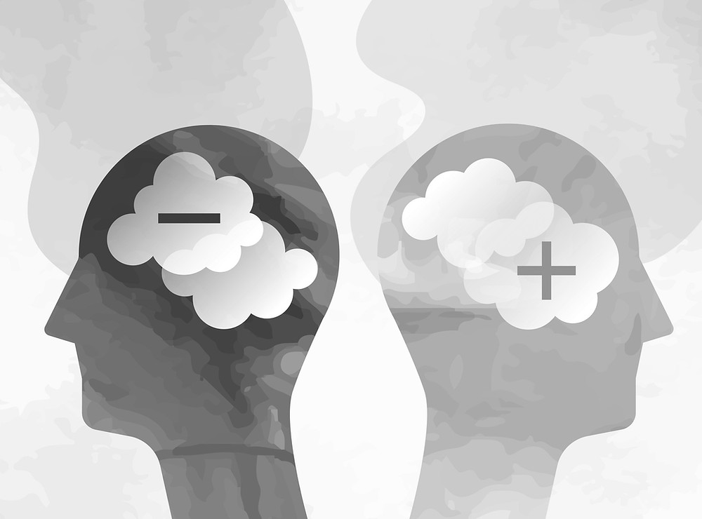 Inner critics - Two heads with positive and negative thoughts