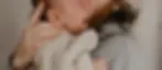 father-holding-crying-baby