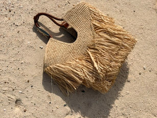 Zimmermann Goldentime Small Fringe Tote beach bag on the sand