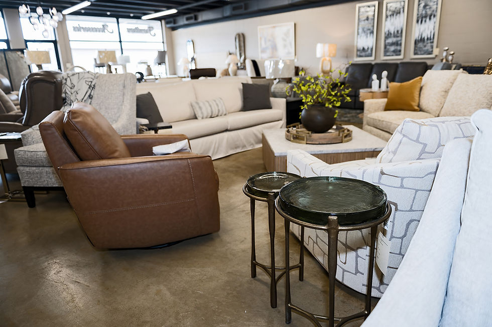 Curated living room display at Binkley Nash furniture store in Gallatin featuring leather chairs and layered seating