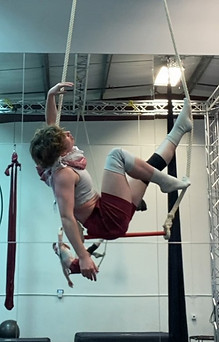 Aerial trapeze coach at Lava City Cirque in Bend Oregon with family