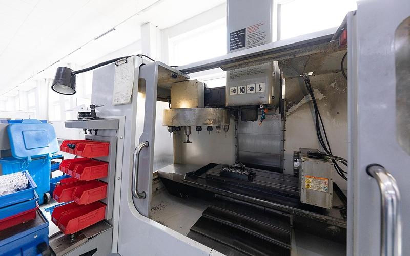 CNC machine workstation prepared for the precision production process.