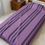 Thumbnail: Purple striped blanket on the bed, Velveteen Plush Blanket, bedroom setting.