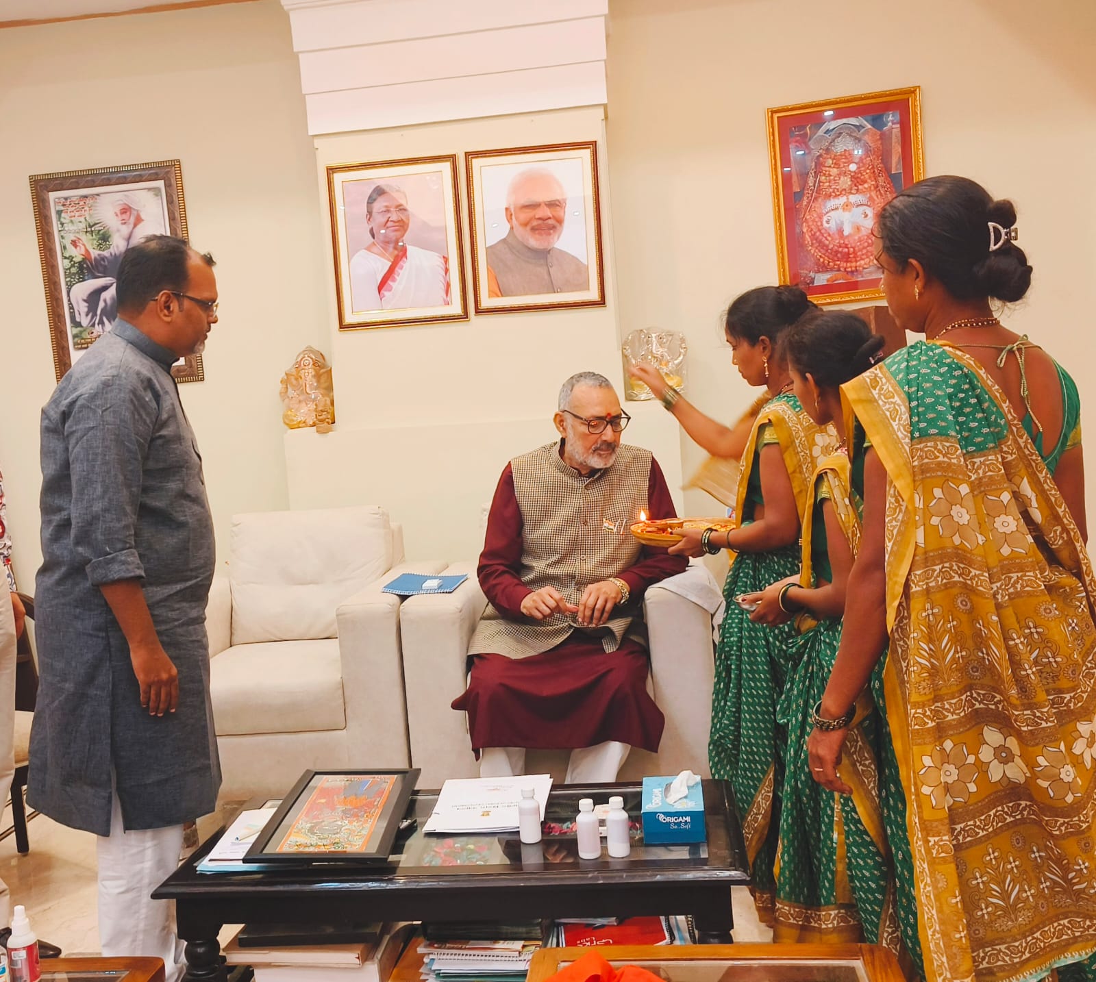 Tribal women greeting elderly dignitary with respect