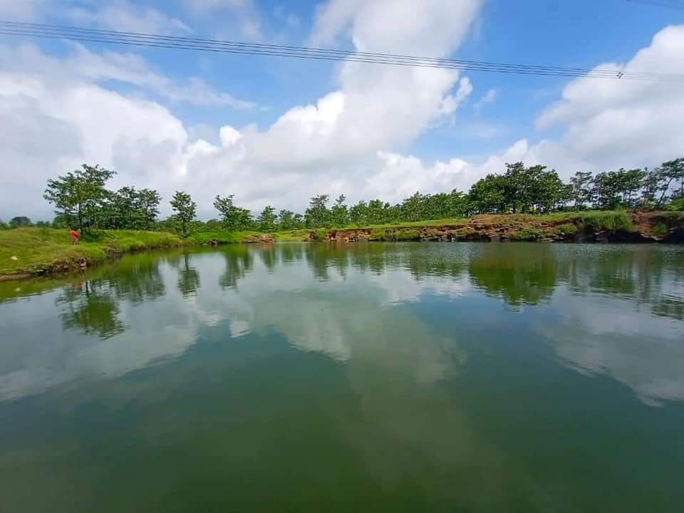 Scenic water pond in eco-tourism village Vikramgad