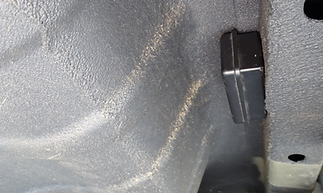 Covert GPS vehicle tracker discreetly installed on the underside of a car by Seekers Investigations in Essex