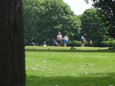 Surveillance photo captured by Seekers Investigations showing individual playing golf during suspected false injury claim — used in insurance fraud investigation.